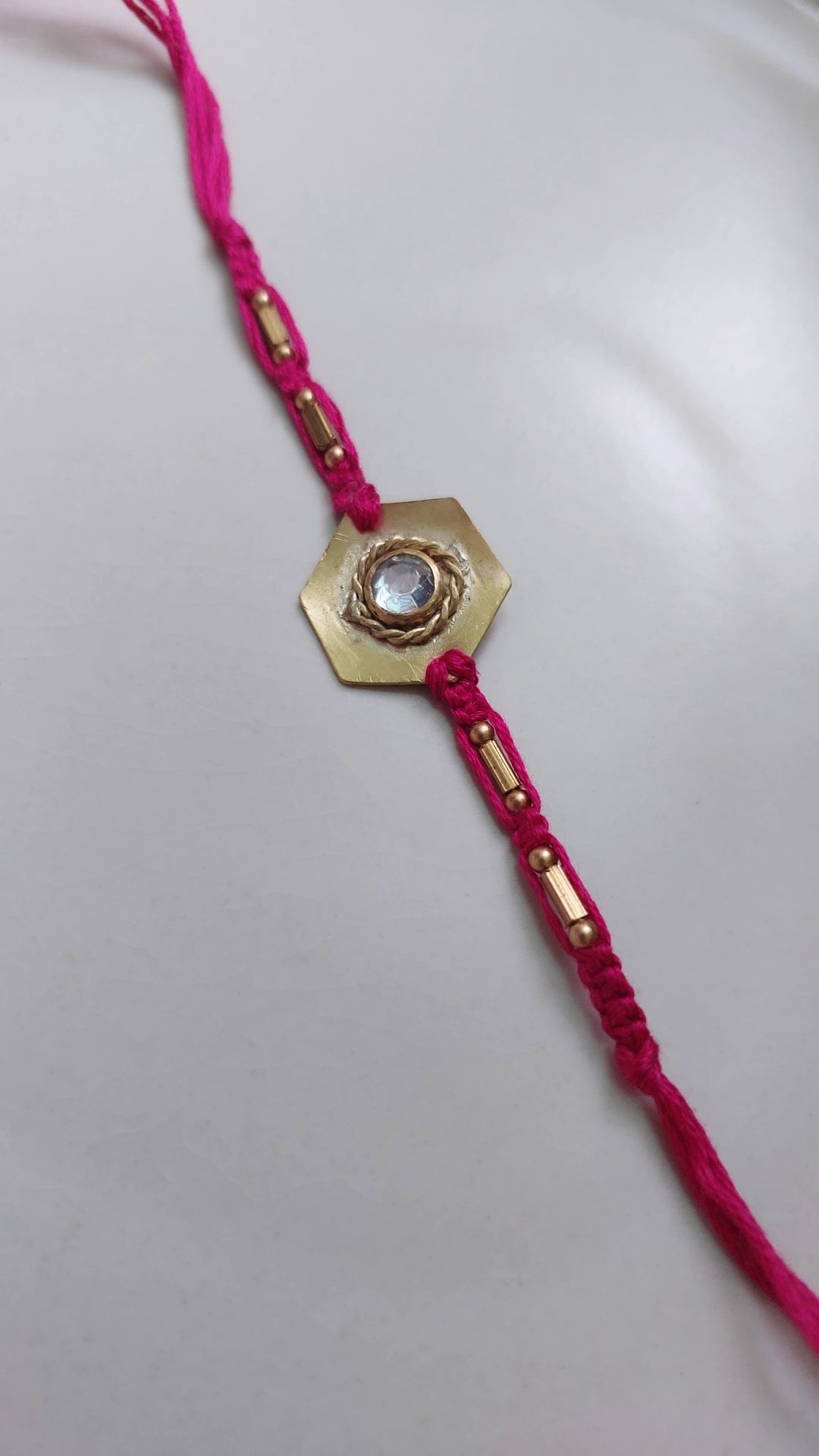 Brass Rakhi Pink 2